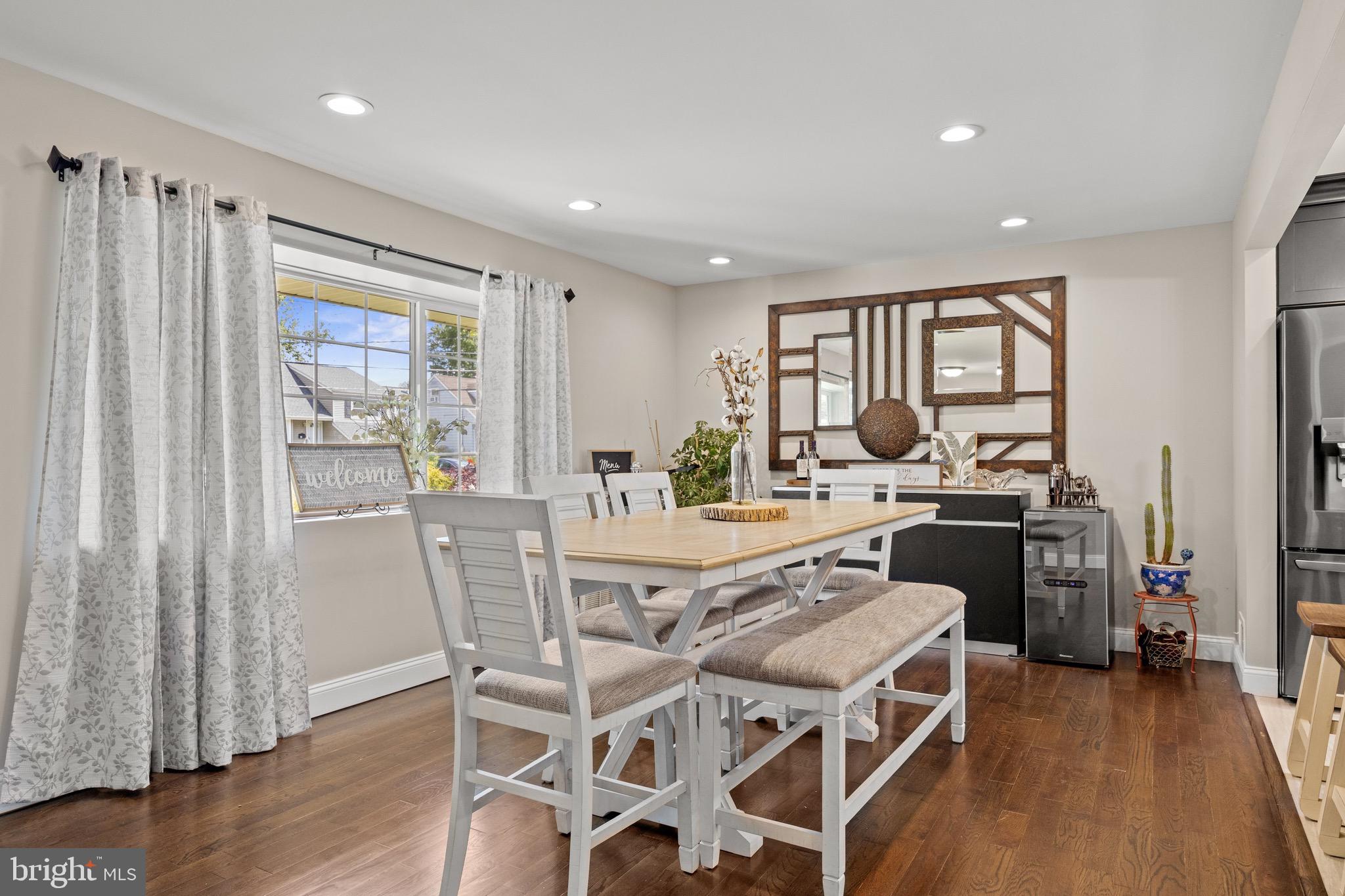 50 Miry Brook Road Hamilton, NJ 08690 - Photo 6 of 28 a view of a dining room with furniture window and wooden floor