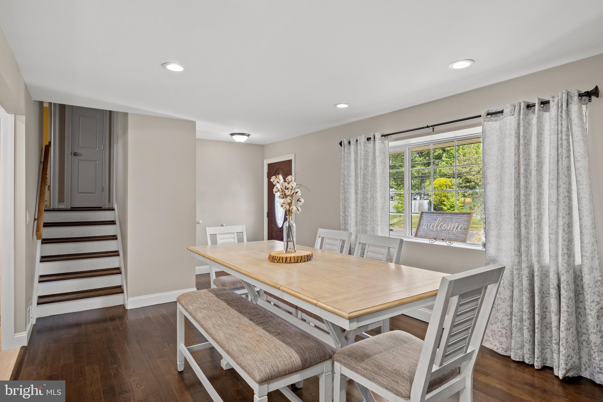 50 Miry Brook Road Hamilton, NJ 08690 - Photo 7 of 28 a view of a dining room with furniture window and wooden floor