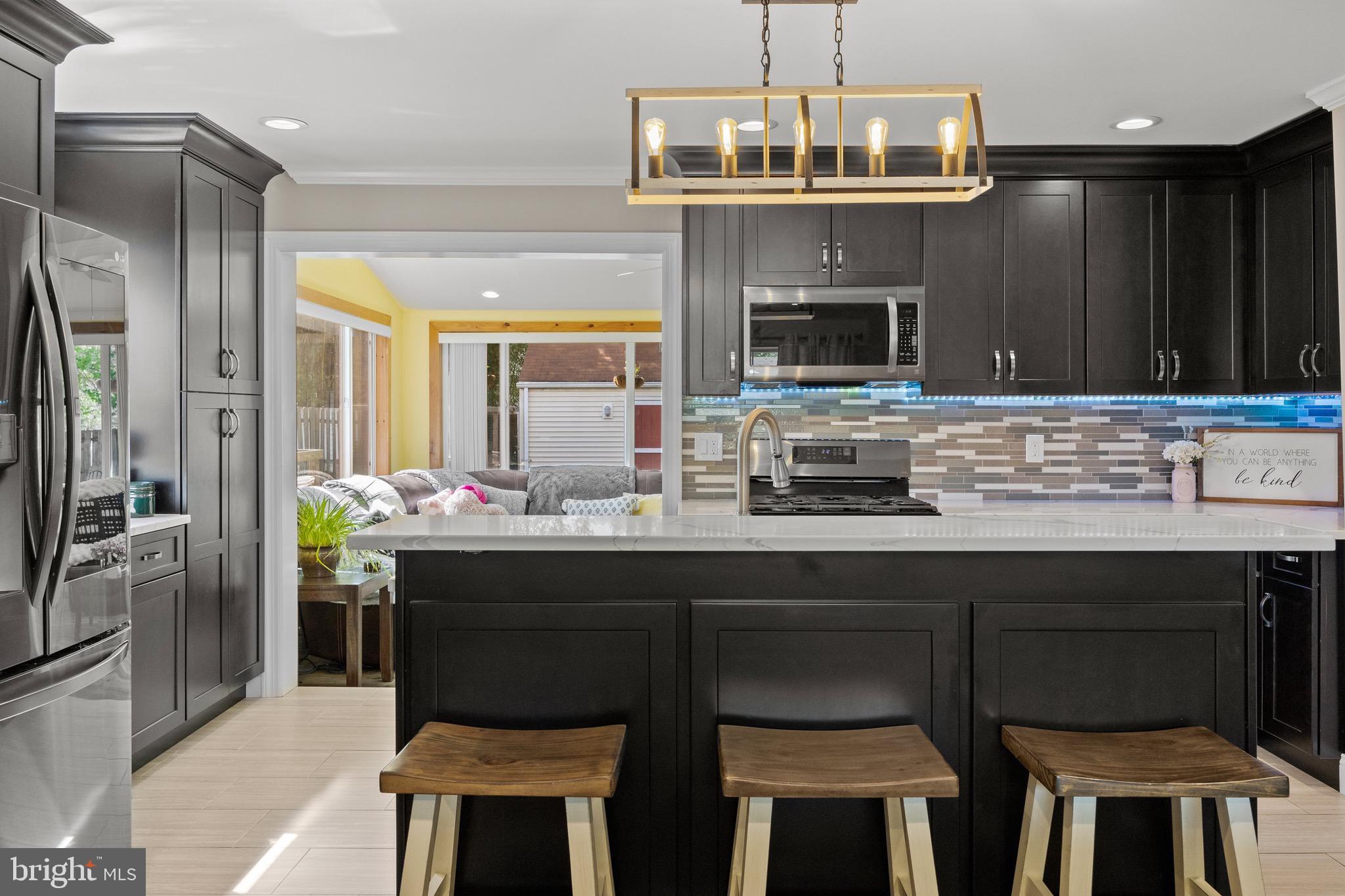 50 Miry Brook Road Hamilton, NJ 08690 - Photo 8 of 28 a kitchen with a sink cabinets and appliances