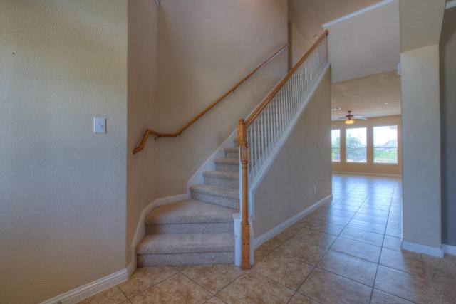 321 Limestone Trail Austin, TX 78737 - Photo 13 of 28 a view of entryway and hall with wooden floor