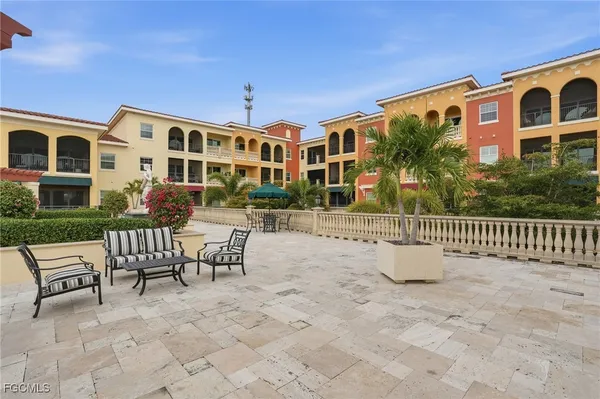 a front view of a house with a patio