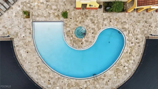 view of a fireplace with mirror