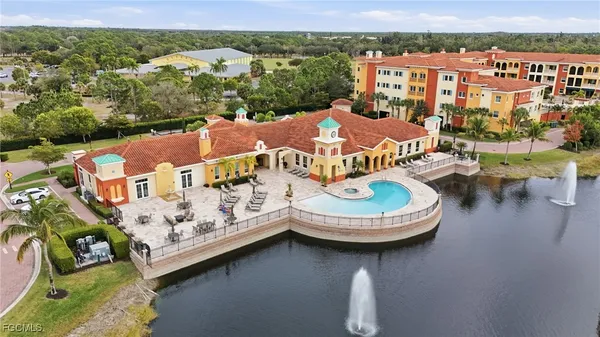 an aerial view of a house with outdoor space pool ocean view