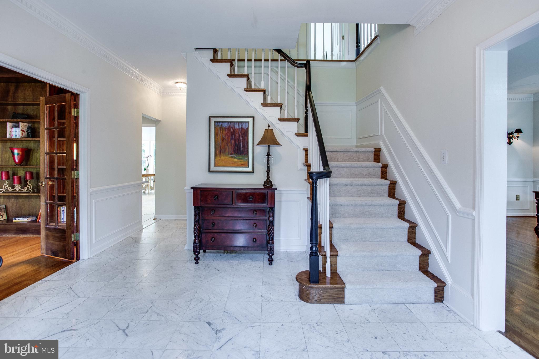 6311 Hunting Ridge Lane McLean, VA 22101 - Photo 2 of 44 Be greeted by the marble floored foyer.
