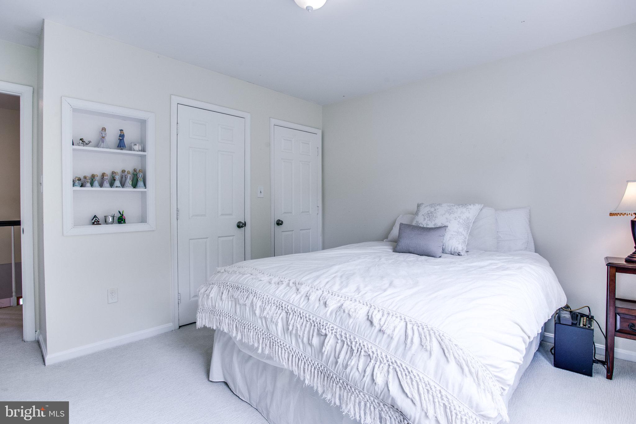 6311 Hunting Ridge Lane McLean, VA 22101 - Photo 30 of 44 Double closets and shelving nook