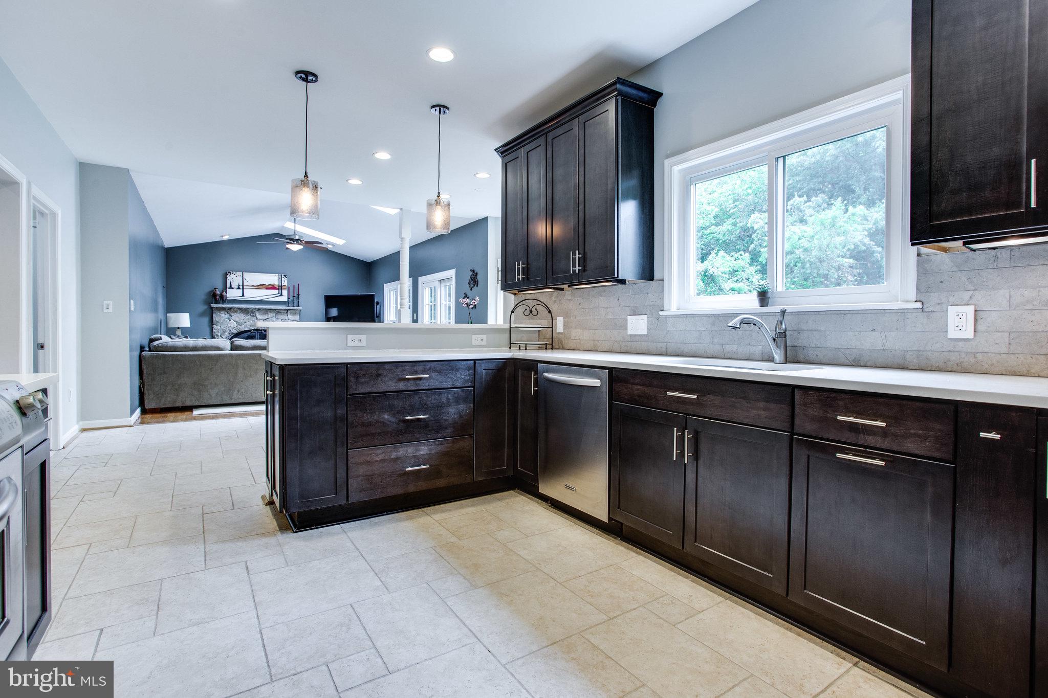 6311 Hunting Ridge Lane McLean, VA 22101 - Photo 10 of 44 Updated kitchen with gorgeous quartz countertops
