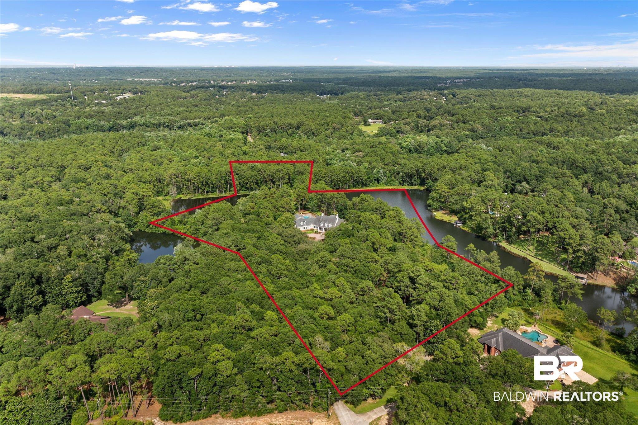 8561 Dawes Lake Road Mobile, AL 36619 - Photo 62 of 63 Aerial view of property and surrounding area with a forest and property parcel outlined