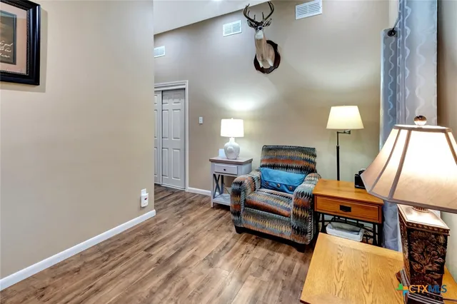 a porch with seating space and balcony