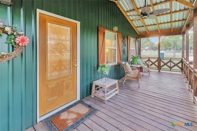 a bathroom with a tub and shower
