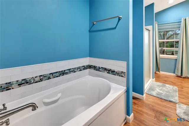 a bedroom with a bed and a closet