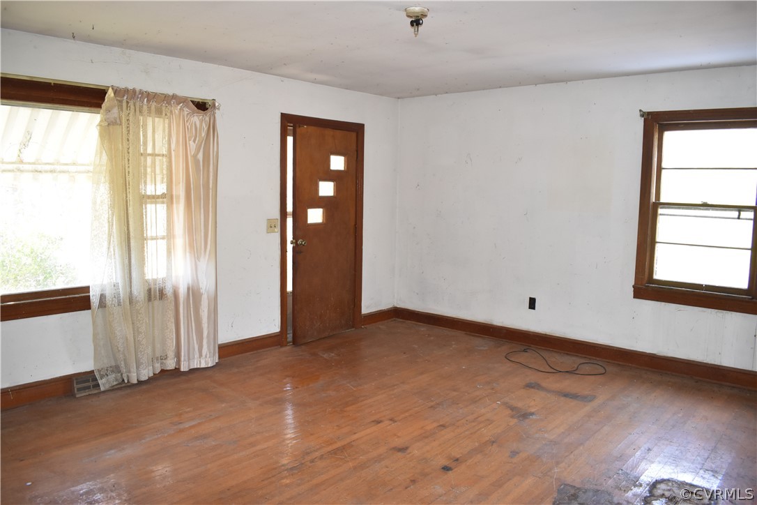9696 Lunenburg County Road Keysville, VA 23947 - Photo 3 of 23 an empty room with windows