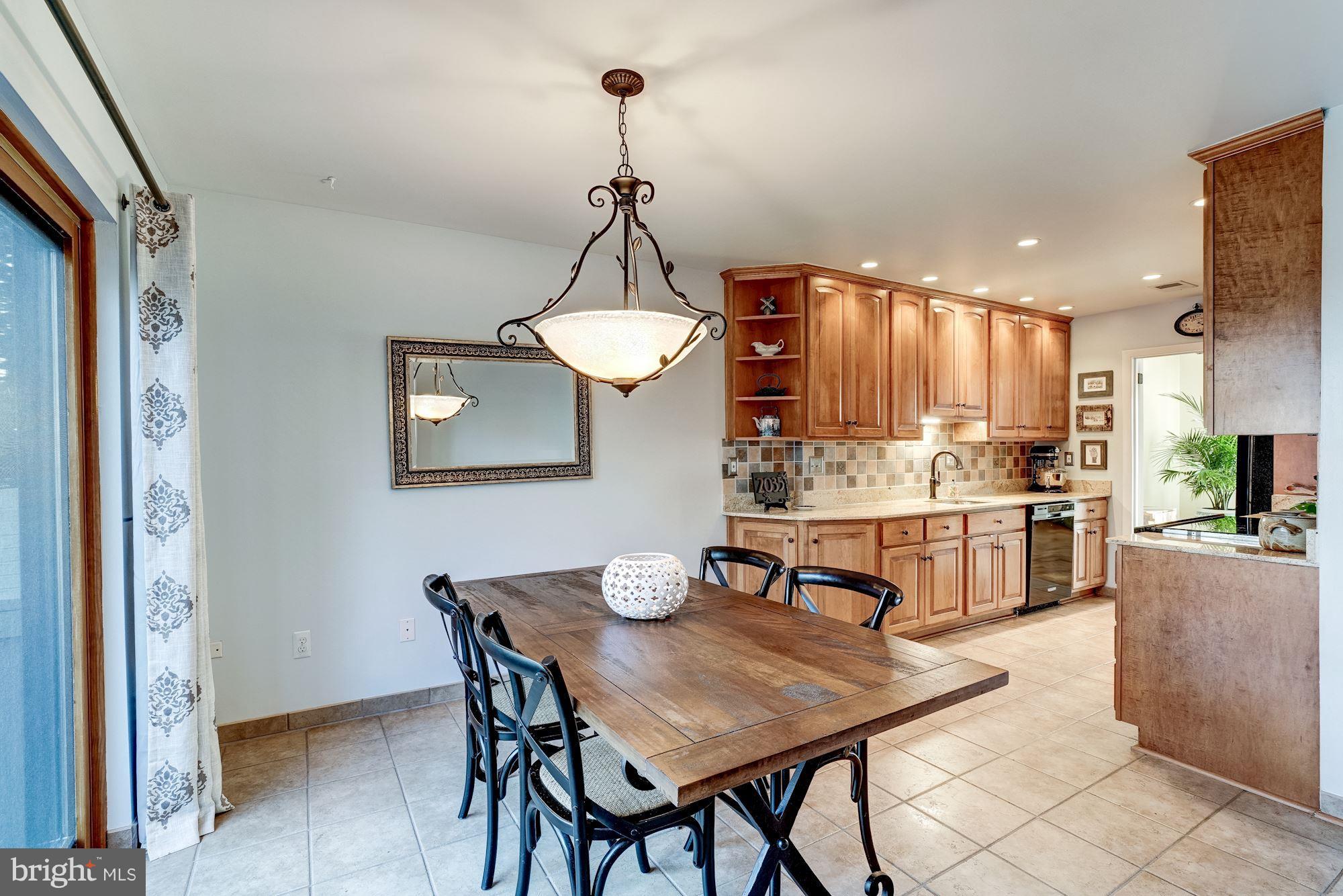 2035 Golf Course Drive Reston, VA 20191 - Photo 11 of 28 a view of a dining room with furniture