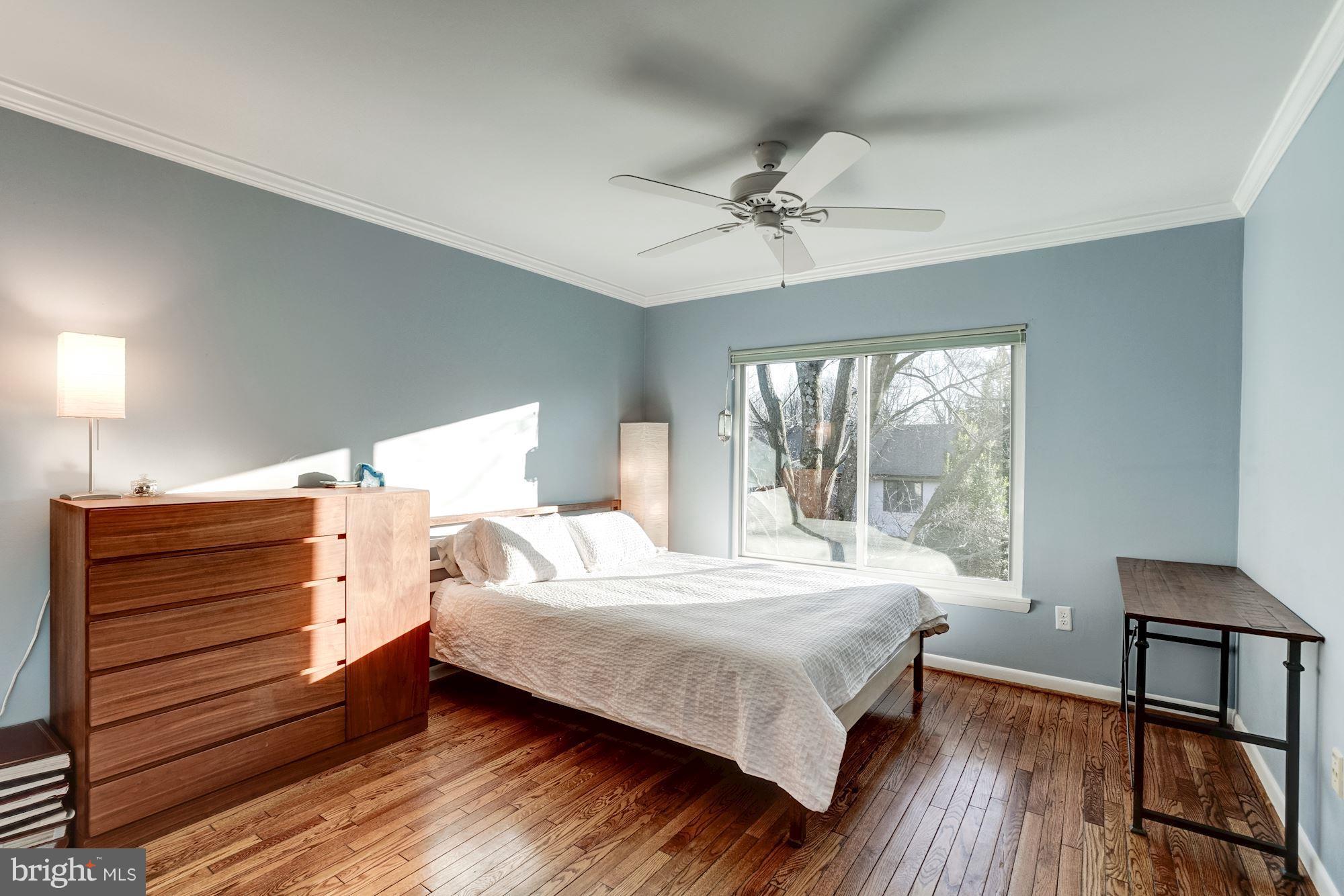 2035 Golf Course Drive Reston, VA 20191 - Photo 13 of 28 a bedroom with a bed and a window