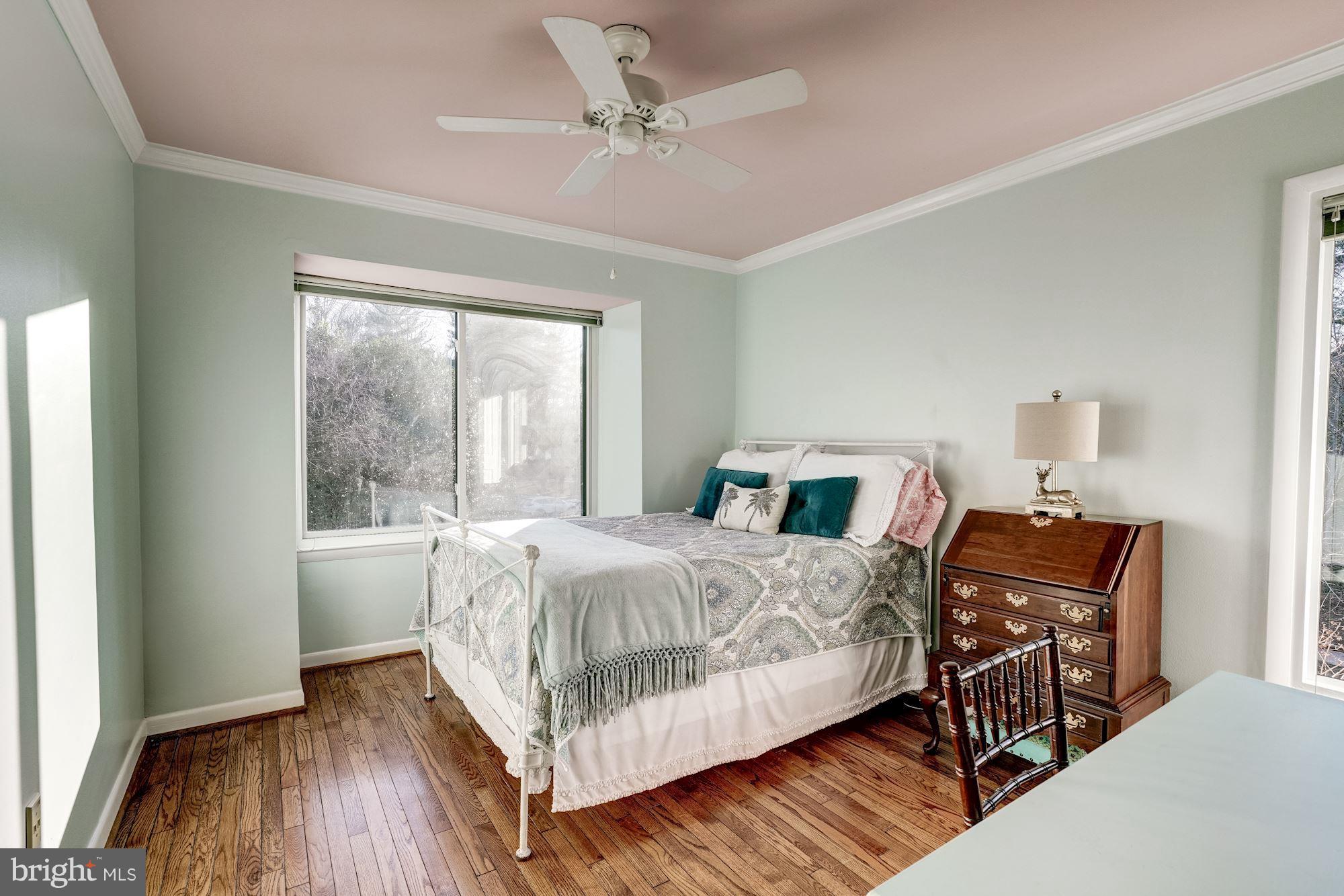 2035 Golf Course Drive Reston, VA 20191 - Photo 14 of 28 a bedroom with a bed and a table
