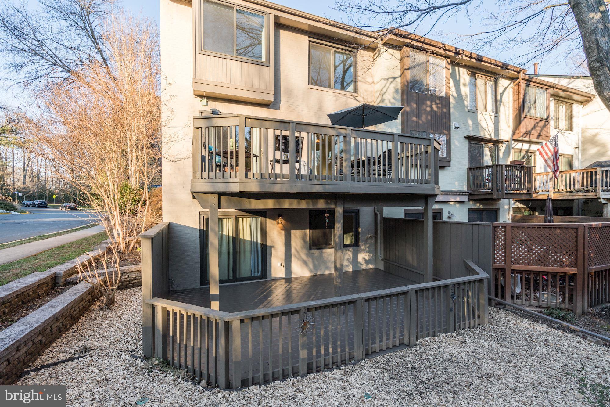 2035 Golf Course Drive Reston, VA 20191 - Photo 25 of 28 a view of a house with a wooden deck