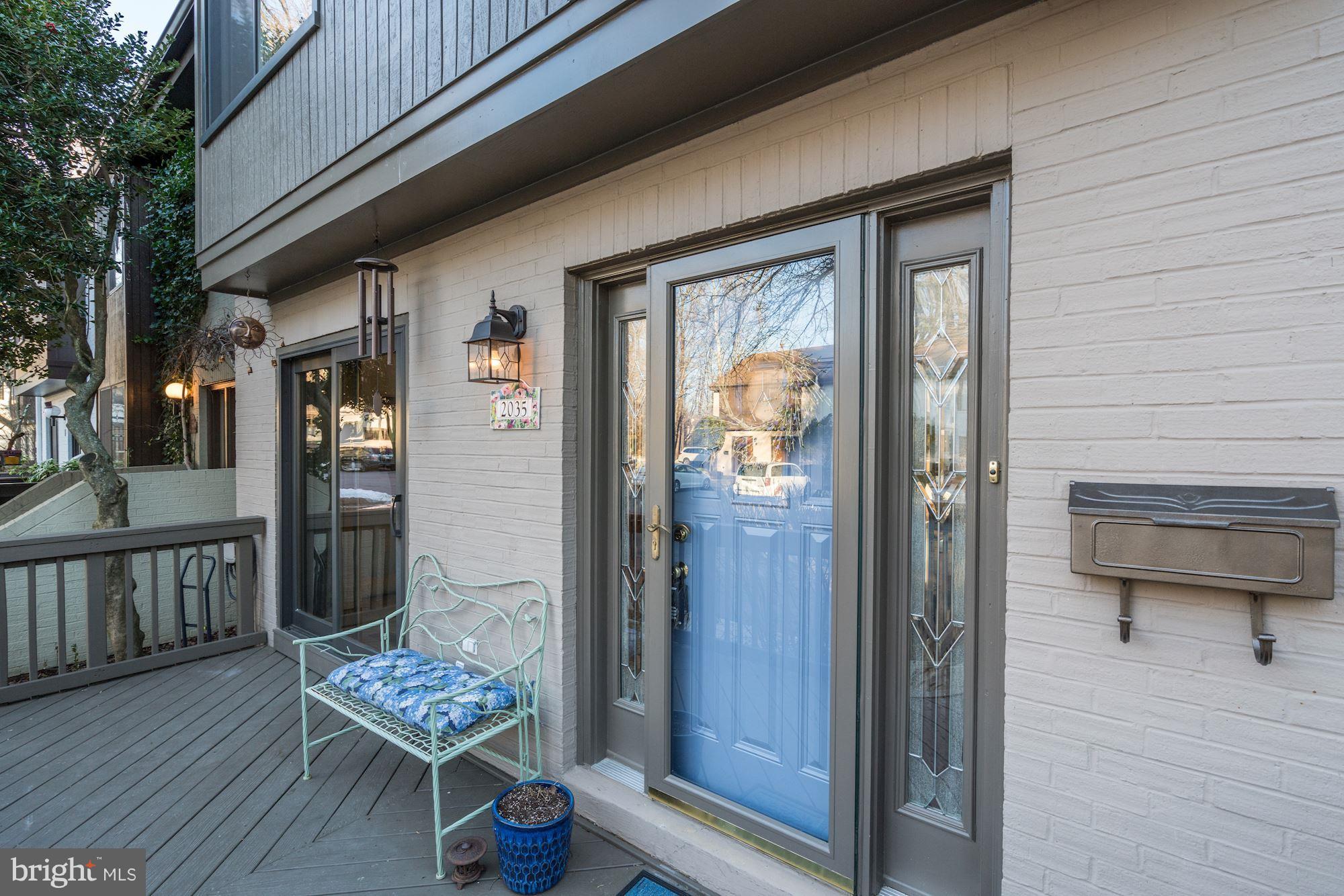 2035 Golf Course Drive Reston, VA 20191 - Photo 4 of 28 a balcony with furniture and a gate