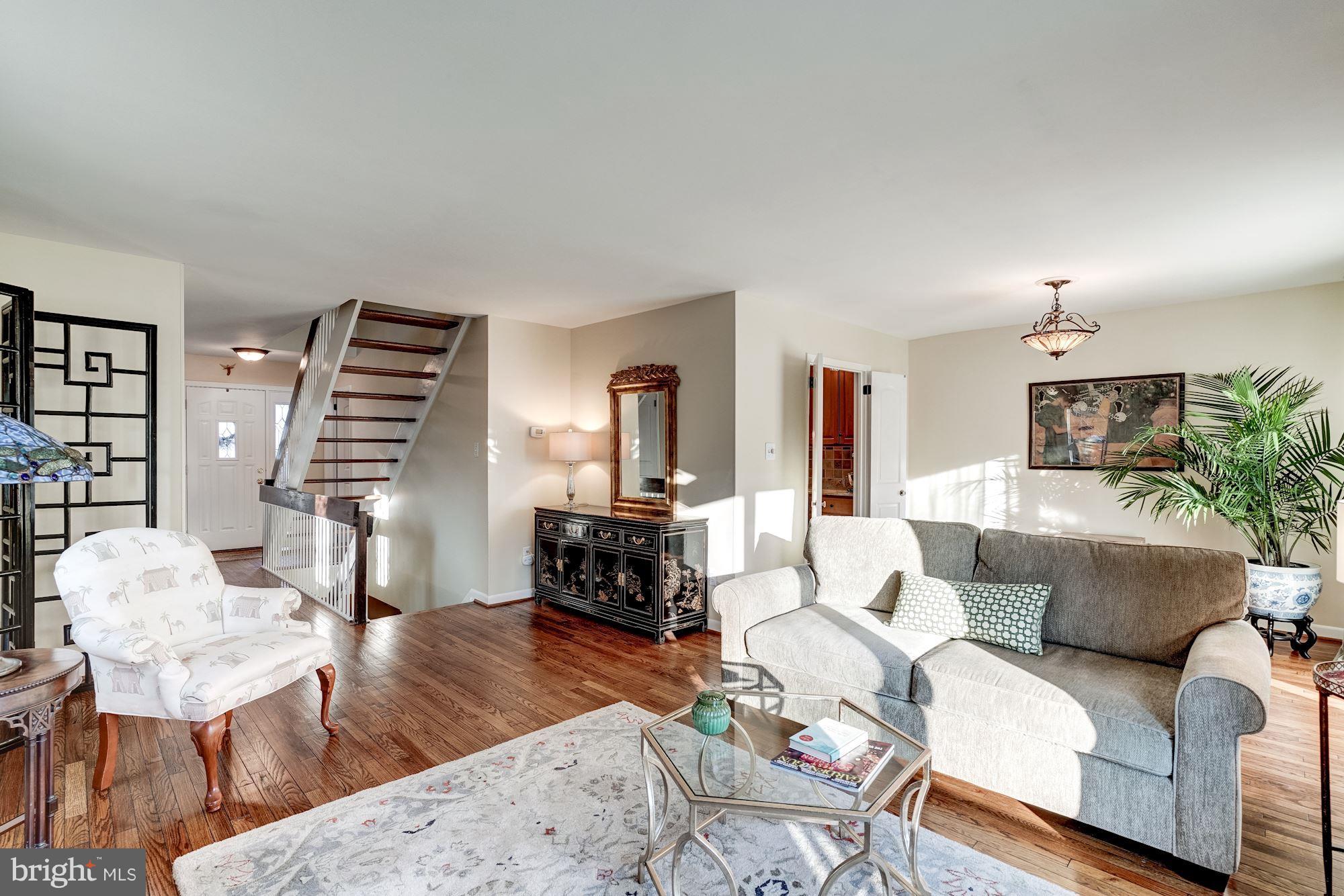 2035 Golf Course Drive Reston, VA 20191 - Photo 9 of 28 a living room with furniture and wooden floor