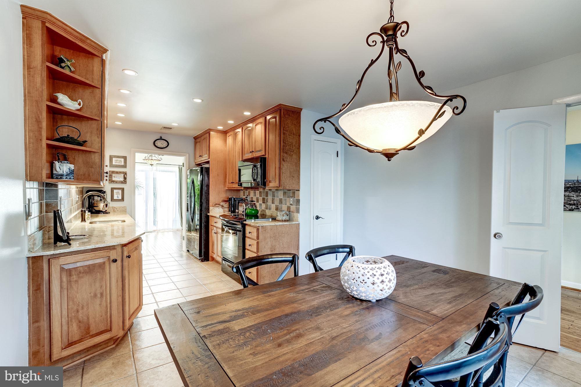 2035 Golf Course Drive Reston, VA 20191 - Photo 10 of 28 a view of a dining room with furniture