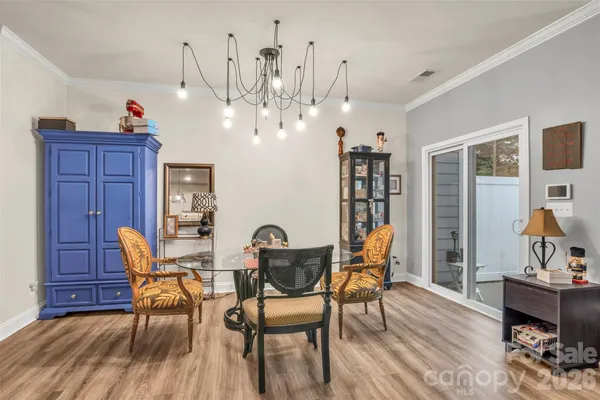 a workspace with furniture window and wooden floor