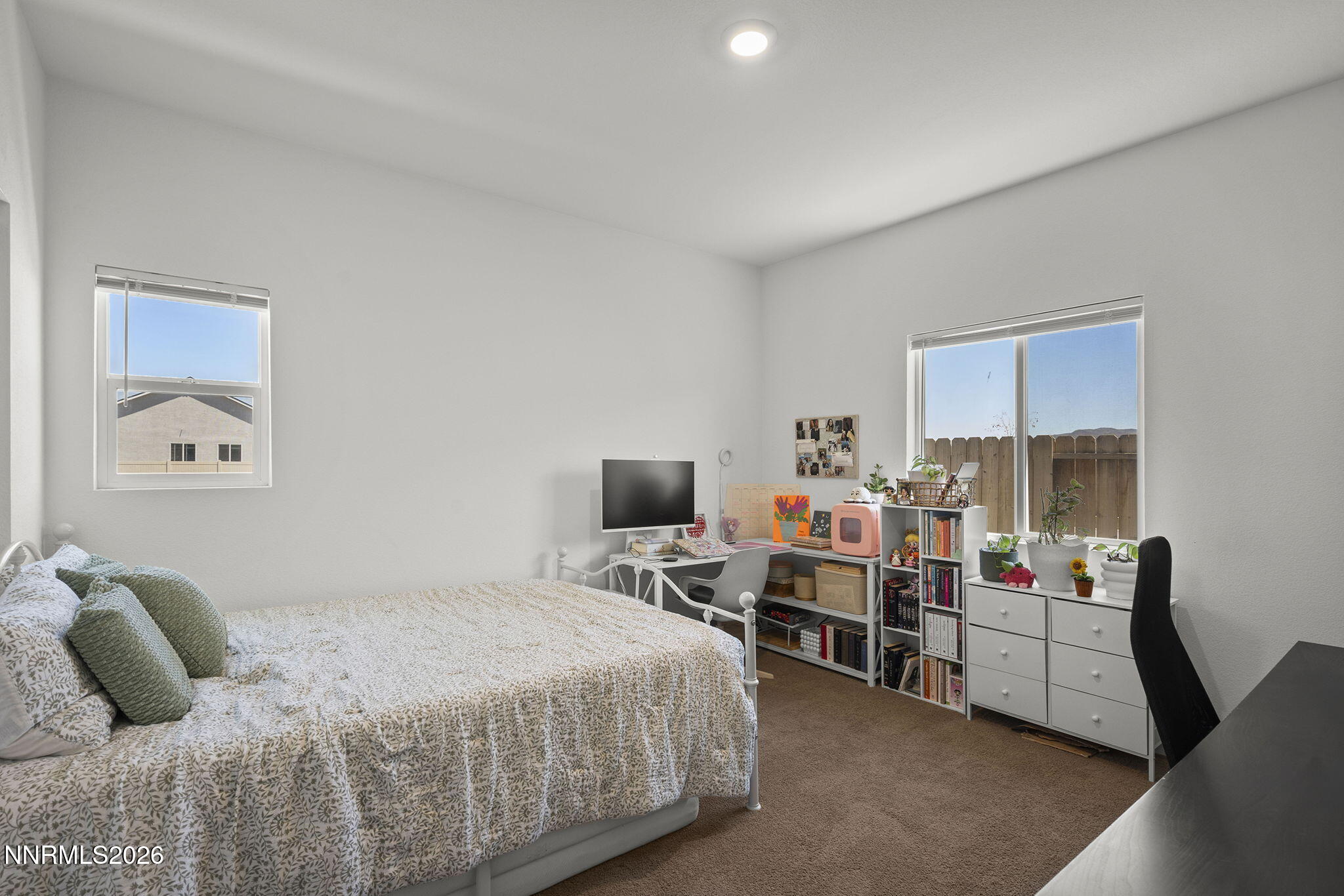 738 Butte Creek Road Dayton, NV 89403 - Photo 15 of 28 a bedroom with a bed furniture and a window
