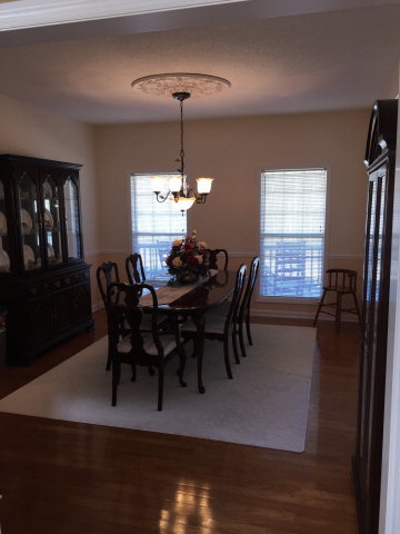 4433 Johnstonville Road Forsyth, GA 31029 - Photo 3 of 37 a view of a dining room with furniture window and wooden floor