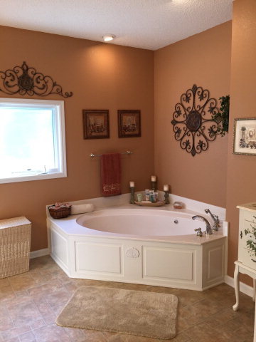 4433 Johnstonville Road Forsyth, GA 31029 - Photo 10 of 37 a bath room with a sink and a couch
