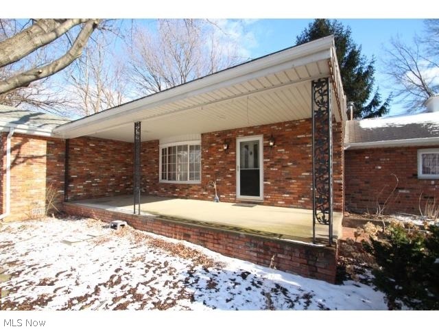 5 Prentice Road Painesville, OH 44077 - Photo 15 of 16 ENJOY SUMMER ON THE SPACIOUS FRONT PORCH.