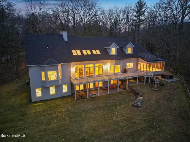 a view of a building with a yard
