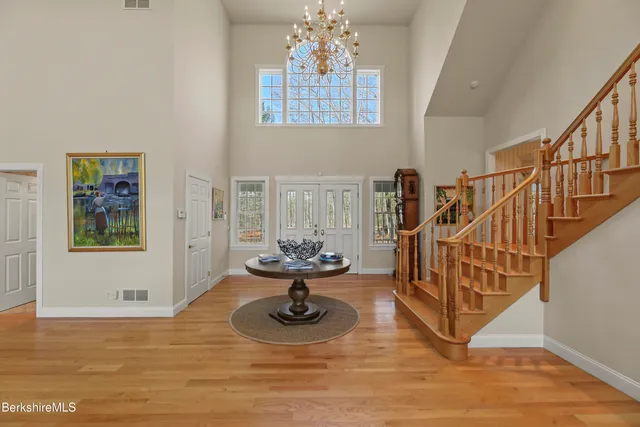 a living room with furniture and a table