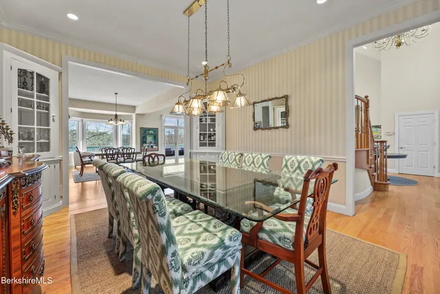 a kitchen with a sink stove and wooden cabinets