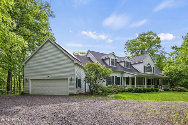 a view of a balcony with wooden floor