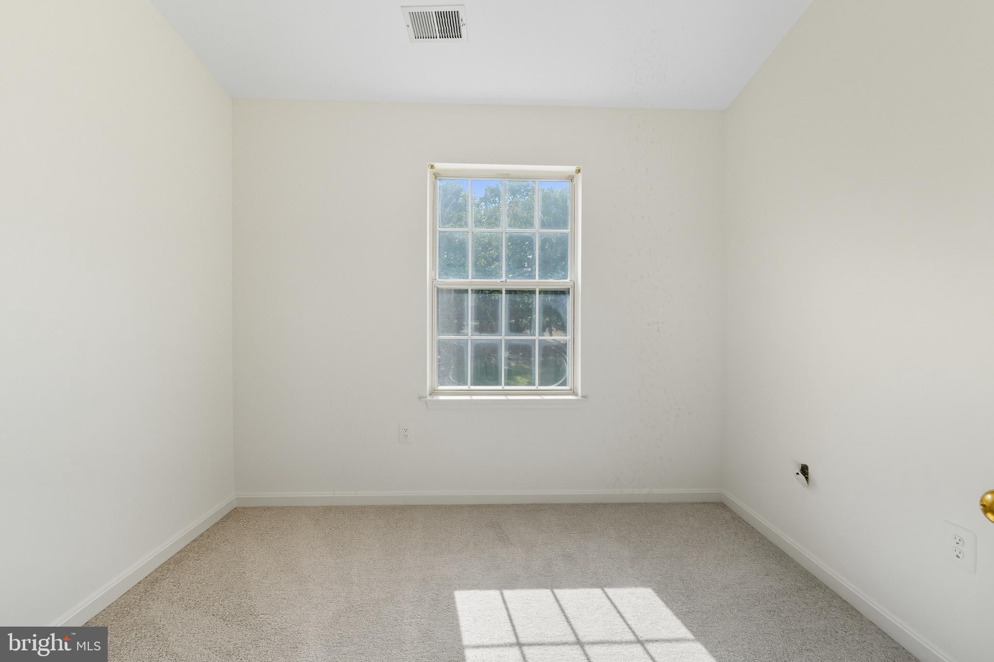 2724 Hunters Gate Terrace Silver Spring, MD 20904 - Photo 30 of 46 an empty room with a window