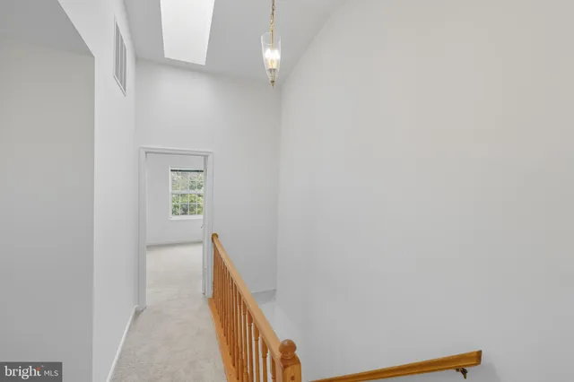 a view of a hallway with entryway