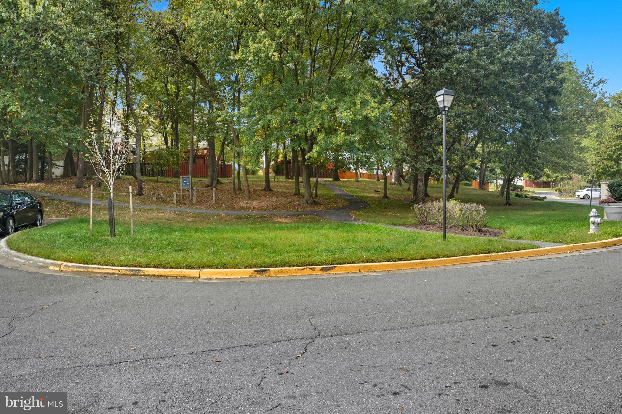 2724 Hunters Gate Terrace Silver Spring, MD 20904 - Photo 45 of 46 a view of a park with large trees