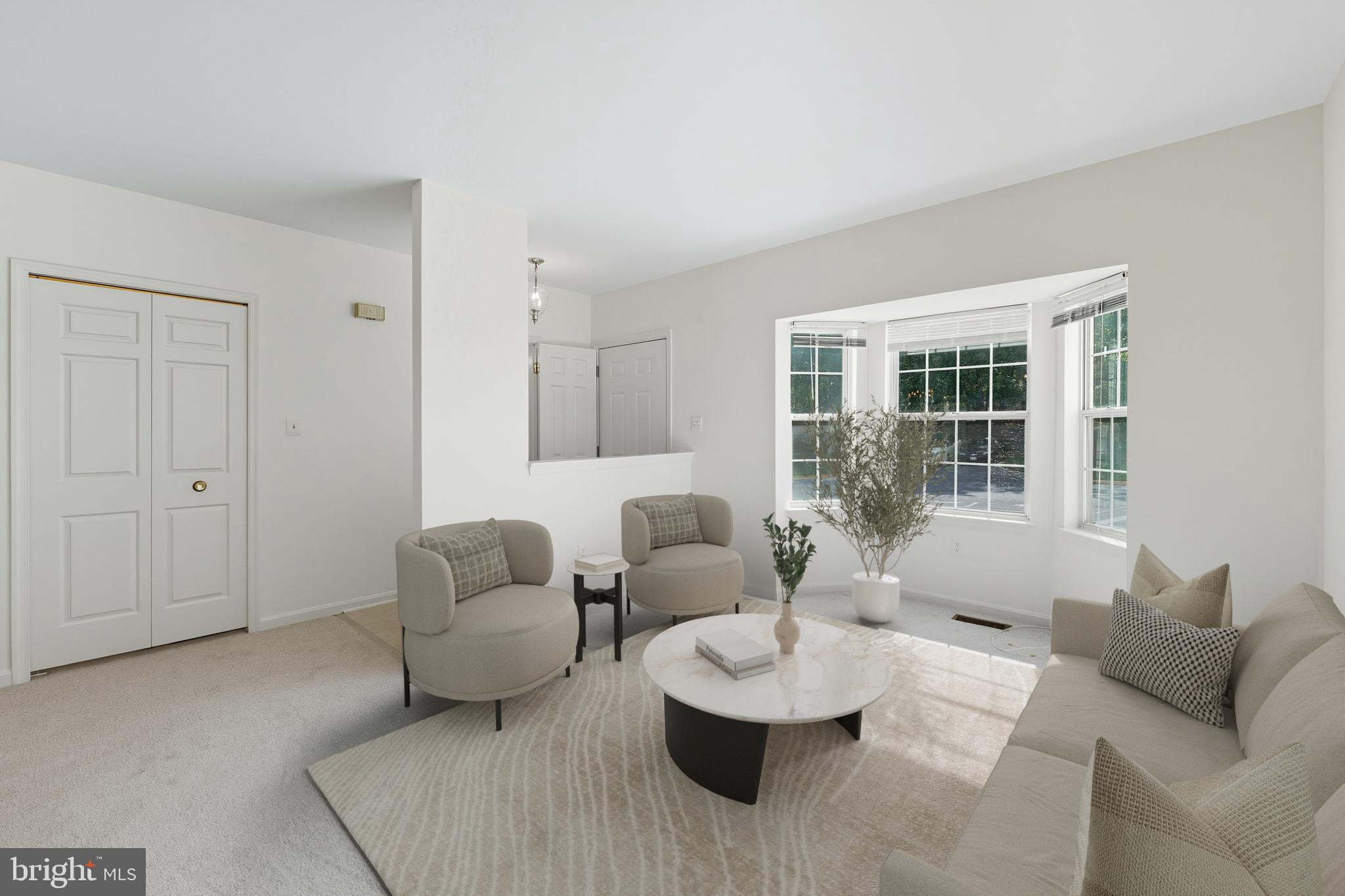 2724 Hunters Gate Terrace Silver Spring, MD 20904 - Photo 5 of 46 a living room with furniture and a large window