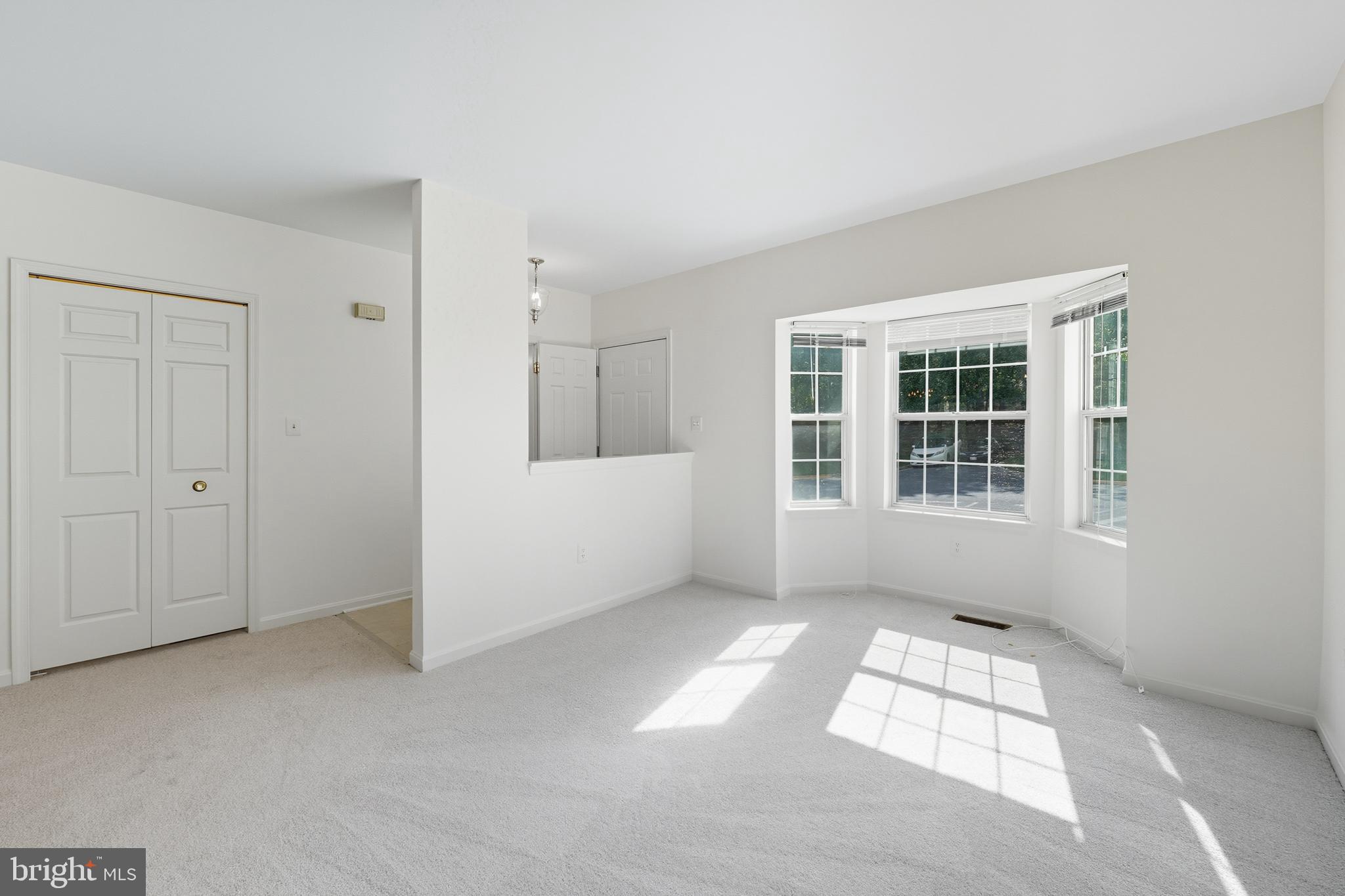 2724 Hunters Gate Terrace Silver Spring, MD 20904 - Photo 6 of 46 an empty room with windows