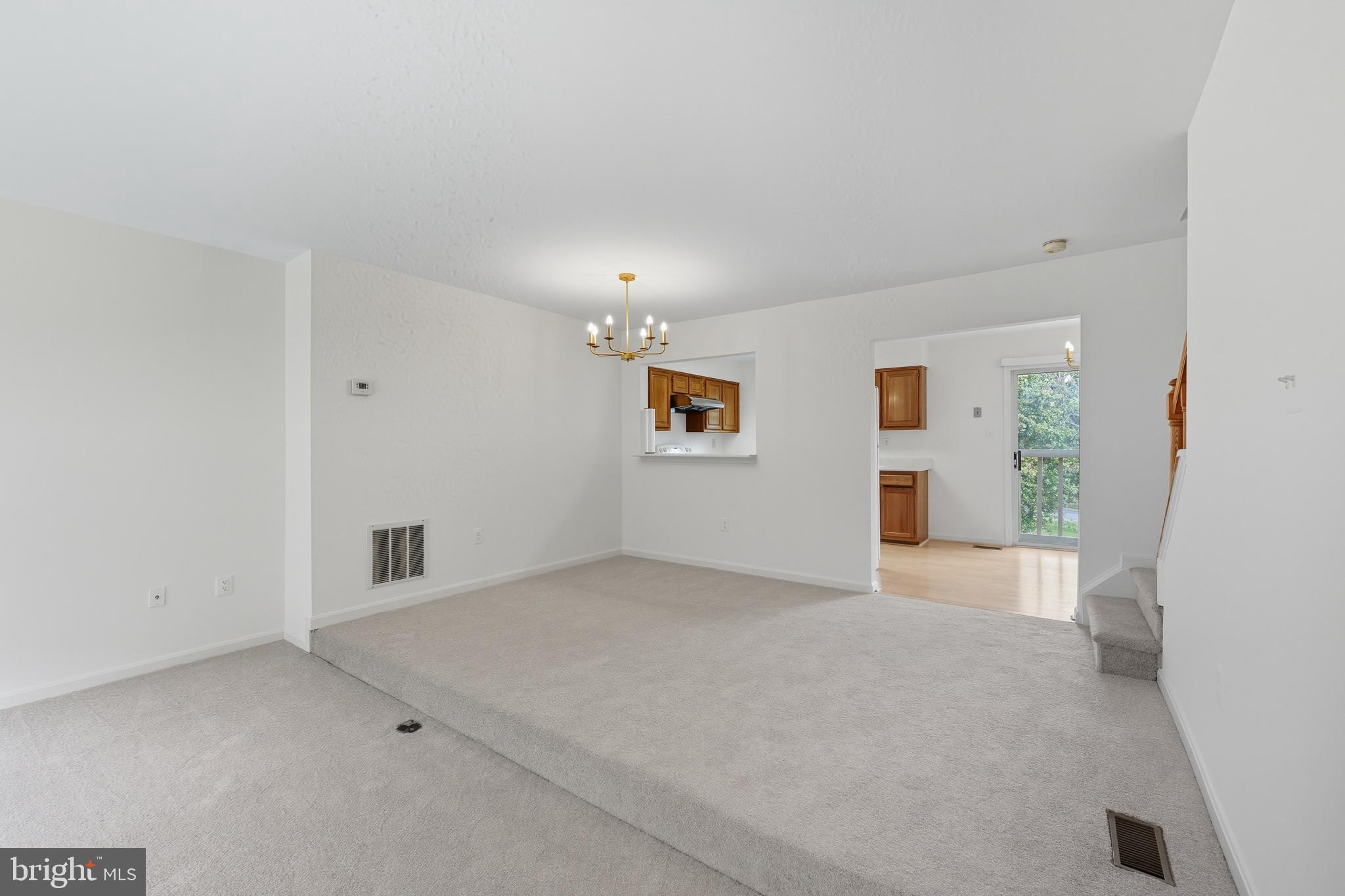 2724 Hunters Gate Terrace Silver Spring, MD 20904 - Photo 8 of 46 an empty room with windows