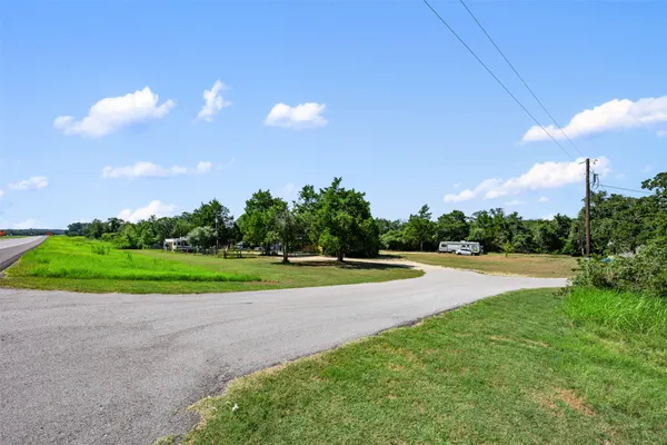a view of a golf course with a lake