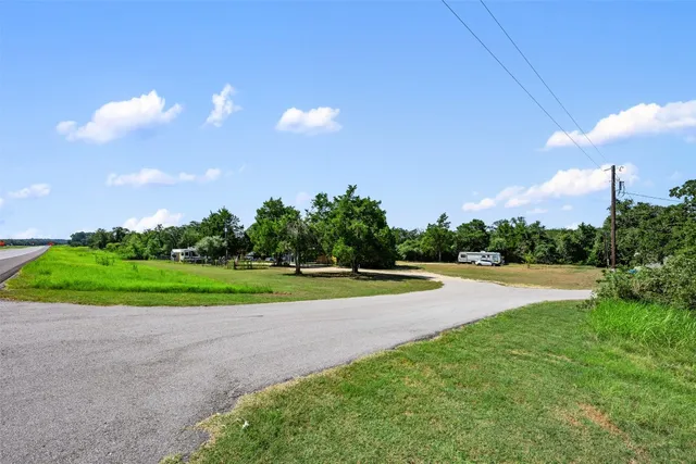 a view of a park with tree s