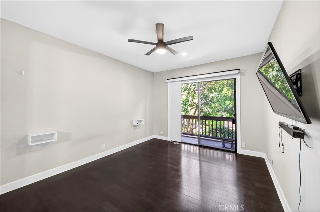 9 Madrona Irvine, CA 92612 - Photo 18 of 38 an empty room with wooden floor and windows
