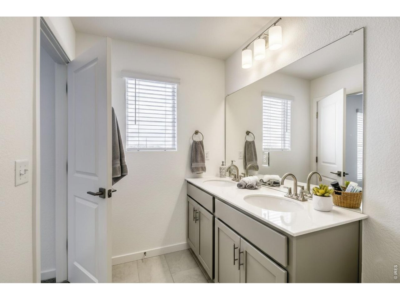 2373 East Suniga Road Fort Collins, CO 80524 - Photo 11 of 29 Dual vanity primary bathrooms