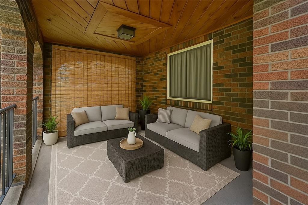 902 Delafield Road Pittsburgh, PA 15215 - Photo 4 of 23 a view of a patio with couches and a potted plant on a table