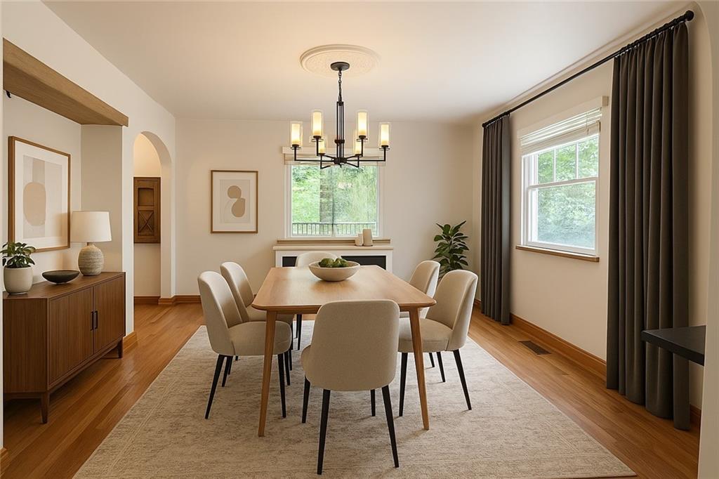 902 Delafield Road Pittsburgh, PA 15215 - Photo 7 of 23 a view of a dining room with furniture windows and wooden floor