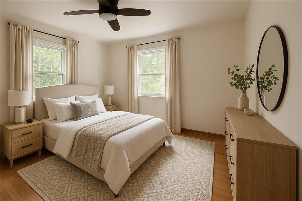902 Delafield Road Pittsburgh, PA 15215 - Photo 10 of 23 a bedroom with a bed a window and a chandelier
