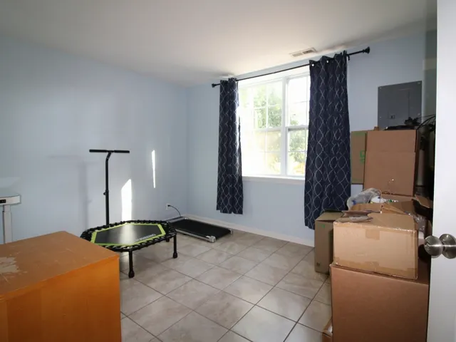 a room with furniture and a window