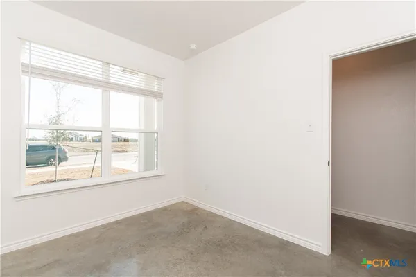 an empty room with a window