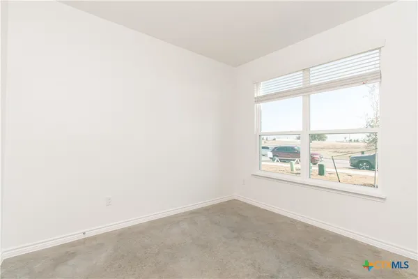 an empty room with a window