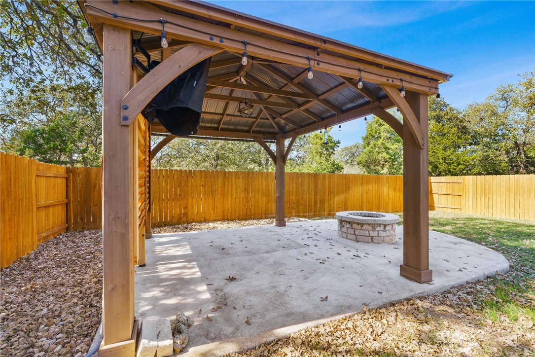 941 Del Raphael Drive Leander, TX 78641 - Photo 28 of 33 This setup makes the backyard feel like a true extension of the home, built entirely around outdoor entertaining