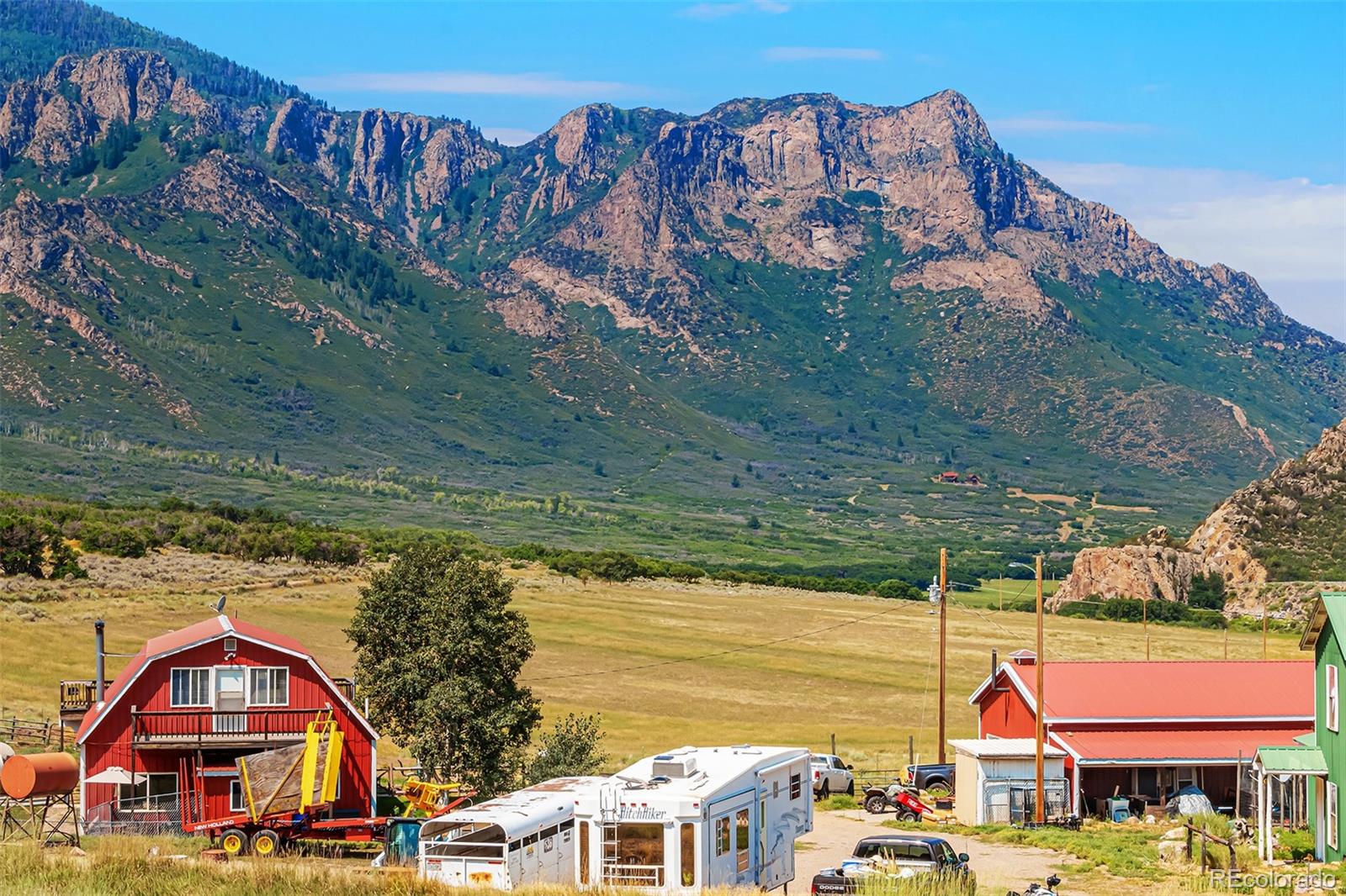 26101-246 16 1/10 Road Whitewater, CO 81527 - Photo 39 of 49 a view of houses with an outdoor space