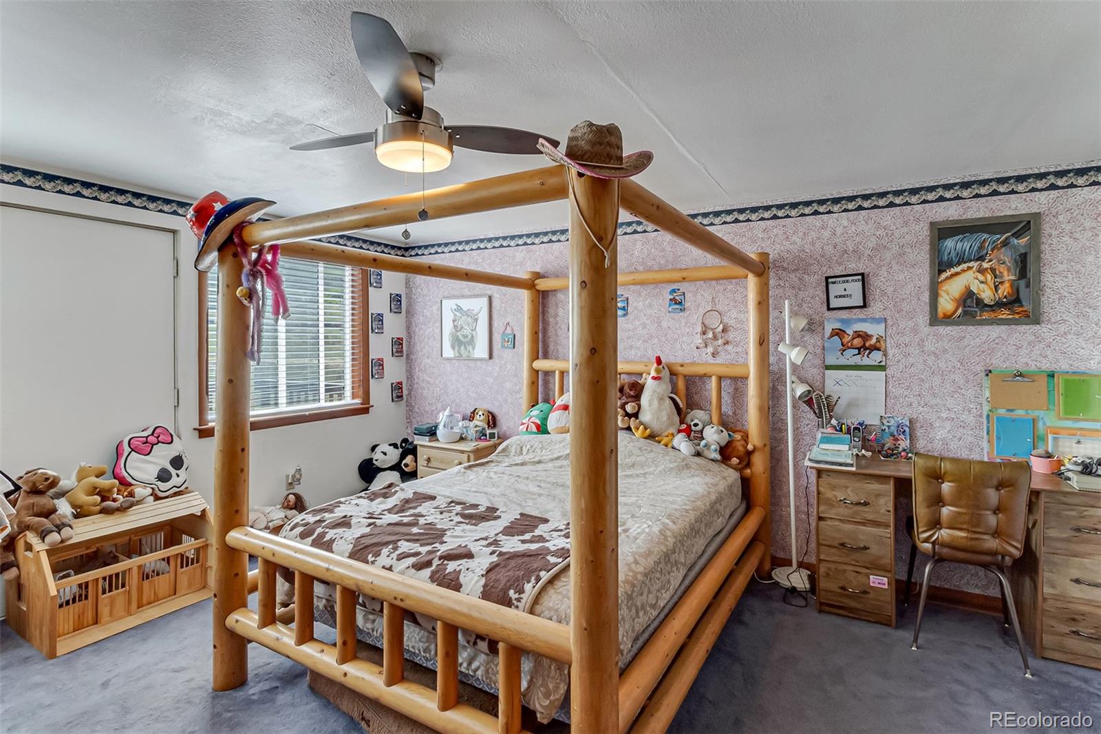 26101-246 16 1/10 Road Whitewater, CO 81527 - Photo 45 of 49 a bedroom with a bed and a table in it